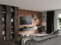 Nowoczesny salon loft inspiracje: ceglana ściana, wisząca szafka RTV, biurko z laptopem, regały i szara kanapa.