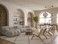 Miękka sofa i fotele w salonie o alabastrowym kolorze, z drewnianymi elementami i roślinnością.