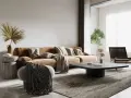 Salon w stylu wabi sabi: brązowa kanapa, kamienny stolik, pleciony fotel i suszone rośliny tworzą przytulną, niedoskonałą przestrzeń.
