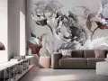 Eleganckie wzory na ścianie w postaci monochromatycznych, rozmytych kwiatów tworzą artystyczną atmosferę w nowoczesnym salonie.