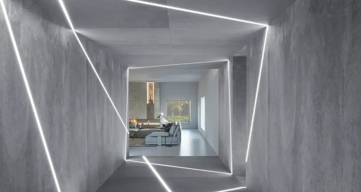 Nowoczesny korytarz z betonowymi ścianami i sufitem, ozdobiony geometrycznym, liniowym podświetleniem. Świetny pomysł na podświetlenie ściany, tworzący futurystyczny efekt.