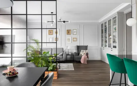 Nowoczesny salon z zielenią i roślinami. Inspiracje na kwiaty w salonie, które ożywią wnętrze.