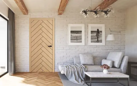 Jasne, oto opis:

Salon w stylu modern farmhouse z drewnianą podłogą w jodełkę, ceglaną ścianą i dwoma obrazami z motywem morza.