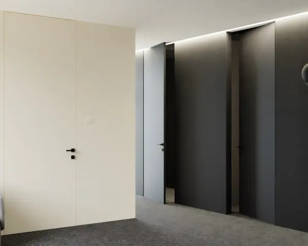 Minimalistyczny korytarz z jasnymi i ciemnymi drzwiami z odwrotną przylgą, tworzącymi elegancką przestrzeń.