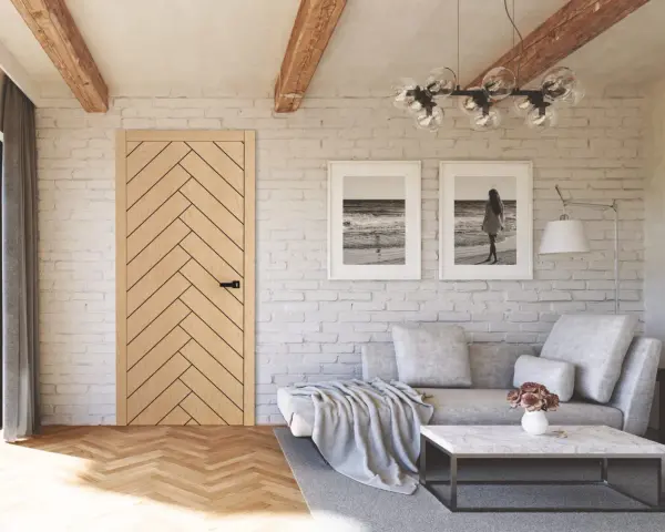 Jasne, oto opis:

Salon w stylu modern farmhouse z drewnianą podłogą w jodełkę, ceglaną ścianą i dwoma obrazami z motywem morza.