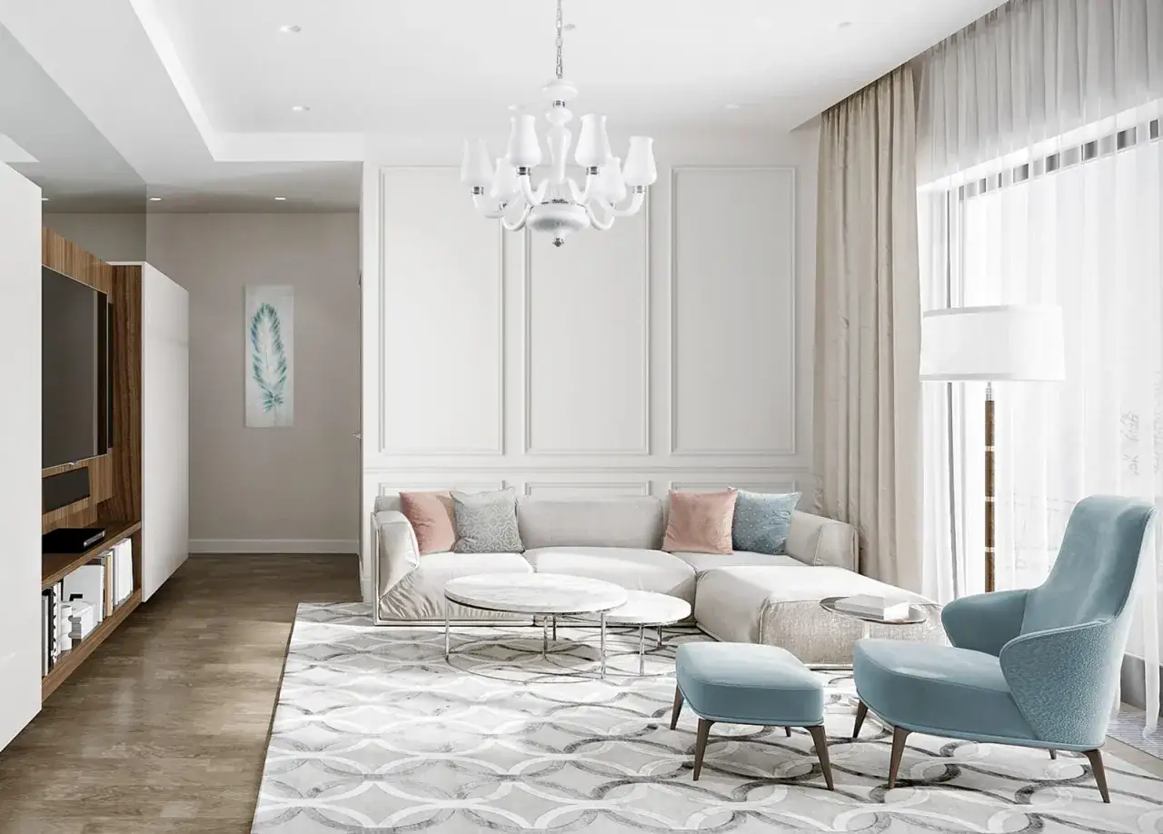 Elegancki salon w stylu modern classic. Jasna sofa, błękitny fotel i dywan z geometrycznym wzorem tworzą przytulną atmosferę.