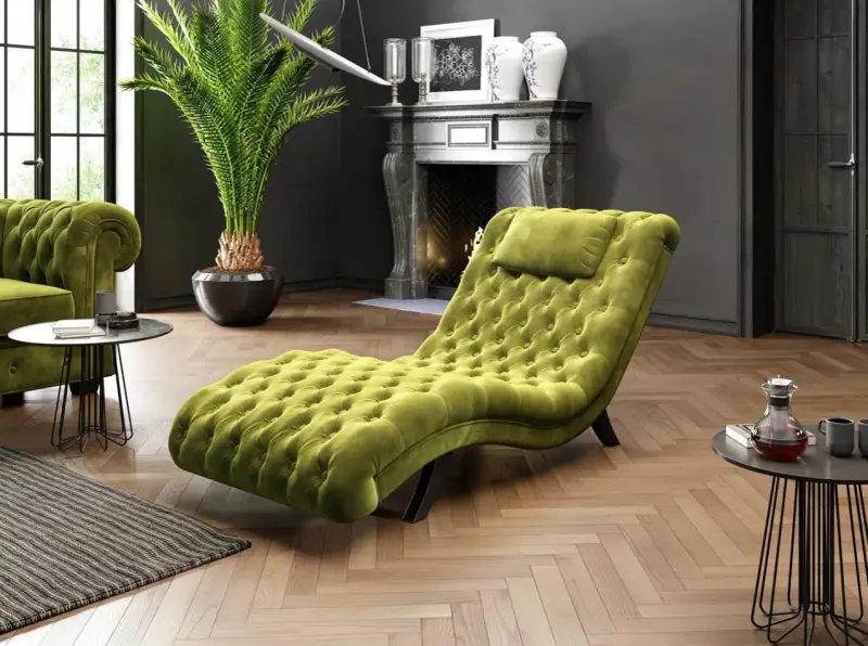 Szezlong co to? Luksusowy, zielony szezlong z pikowanymi guzikami, idealny do relaksu w eleganckim salonie.